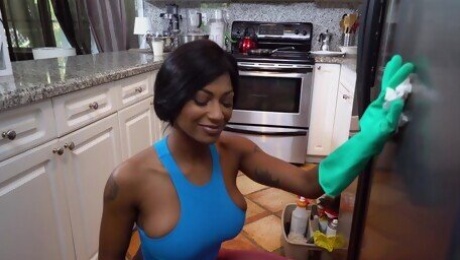 Ebony cleans around the house and fucks